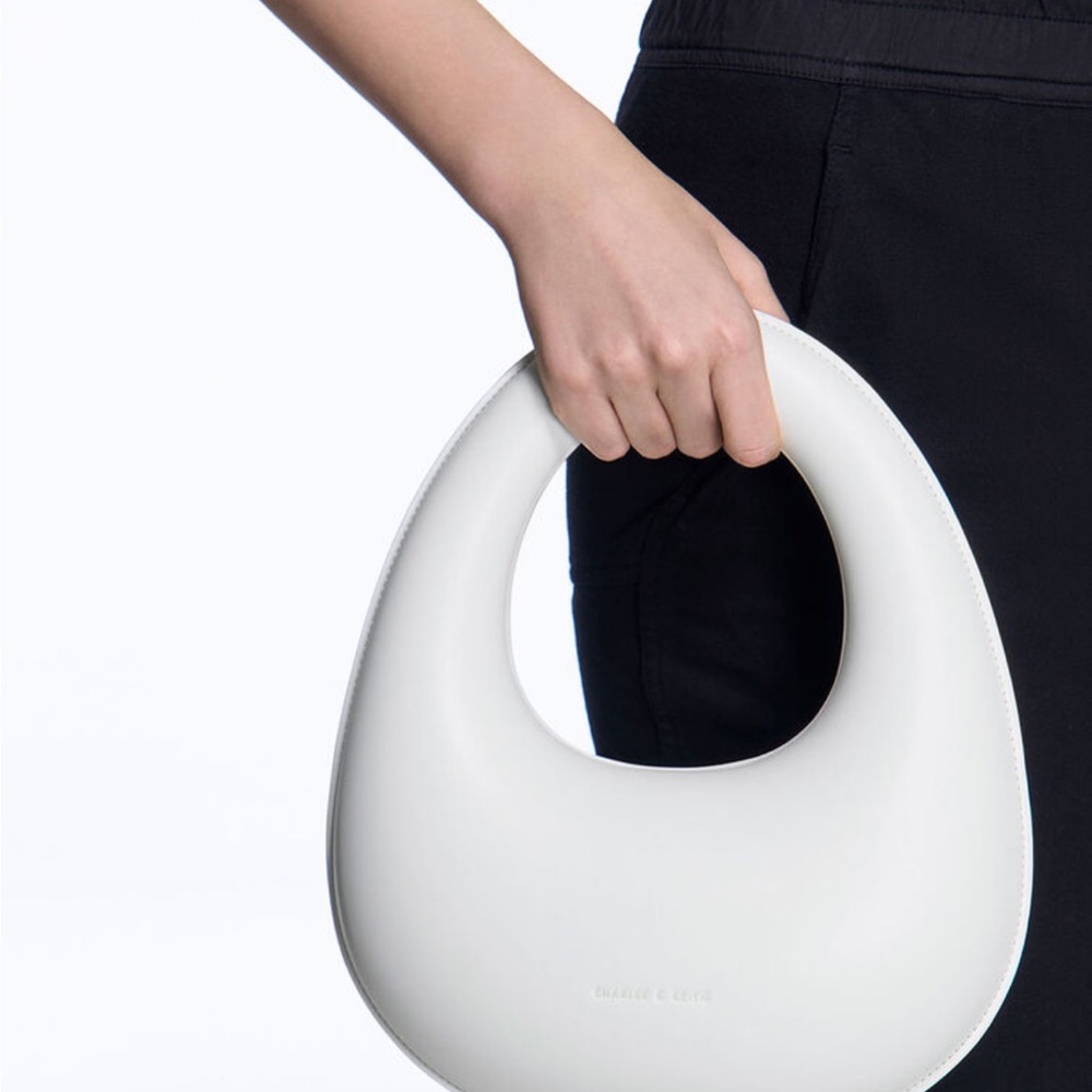Charles & Keith Sculptural Top Handle Moon Bag - White